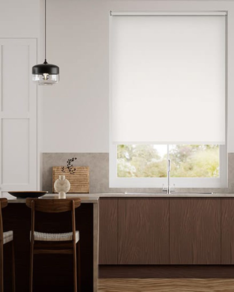 Elegant roller blinds that provide adjustable light filtration and enhance the décor in a light-filled space.