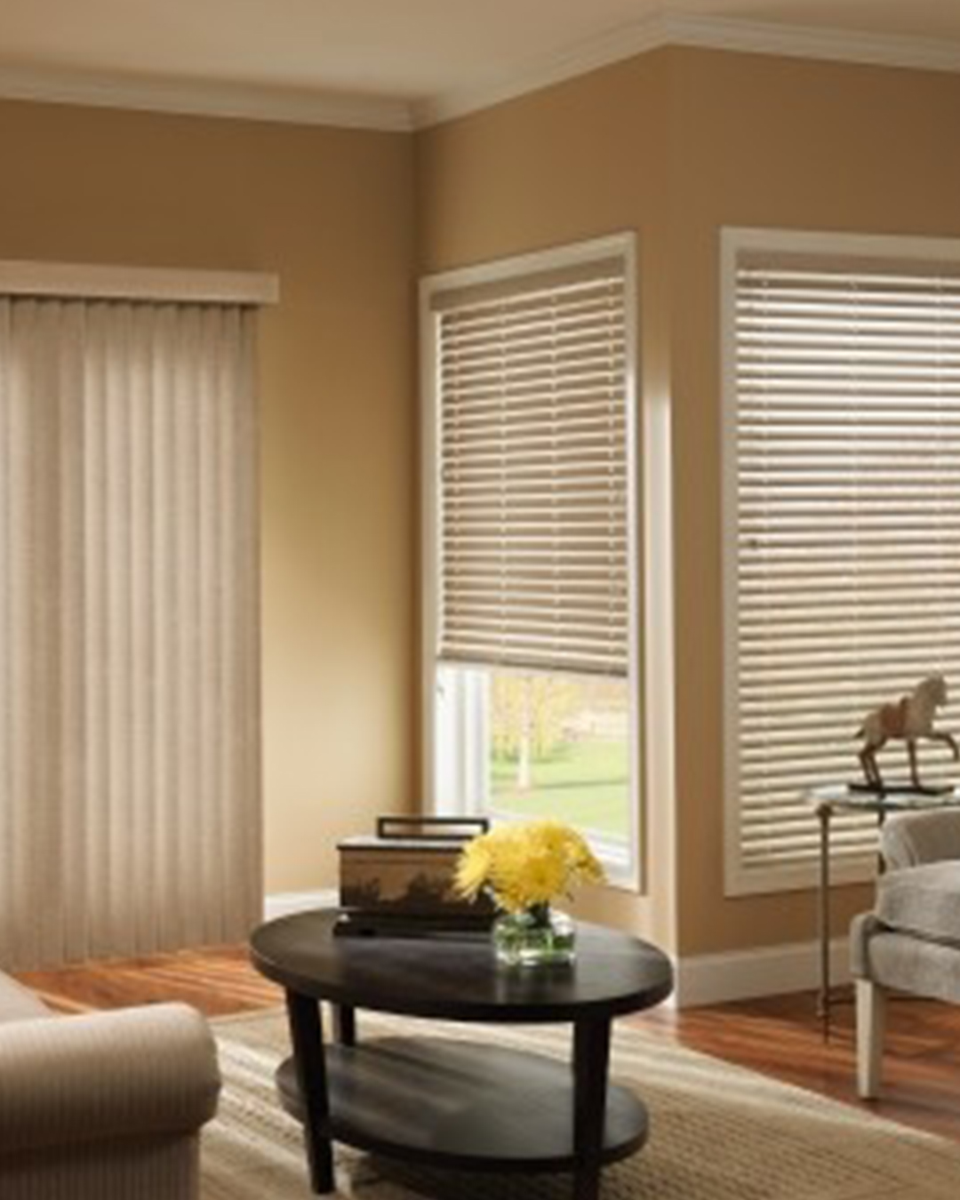 Sunlight is filtered by tastefully designed vinyl blinds that are partially closed, adding to the room's aesthetic appeal.