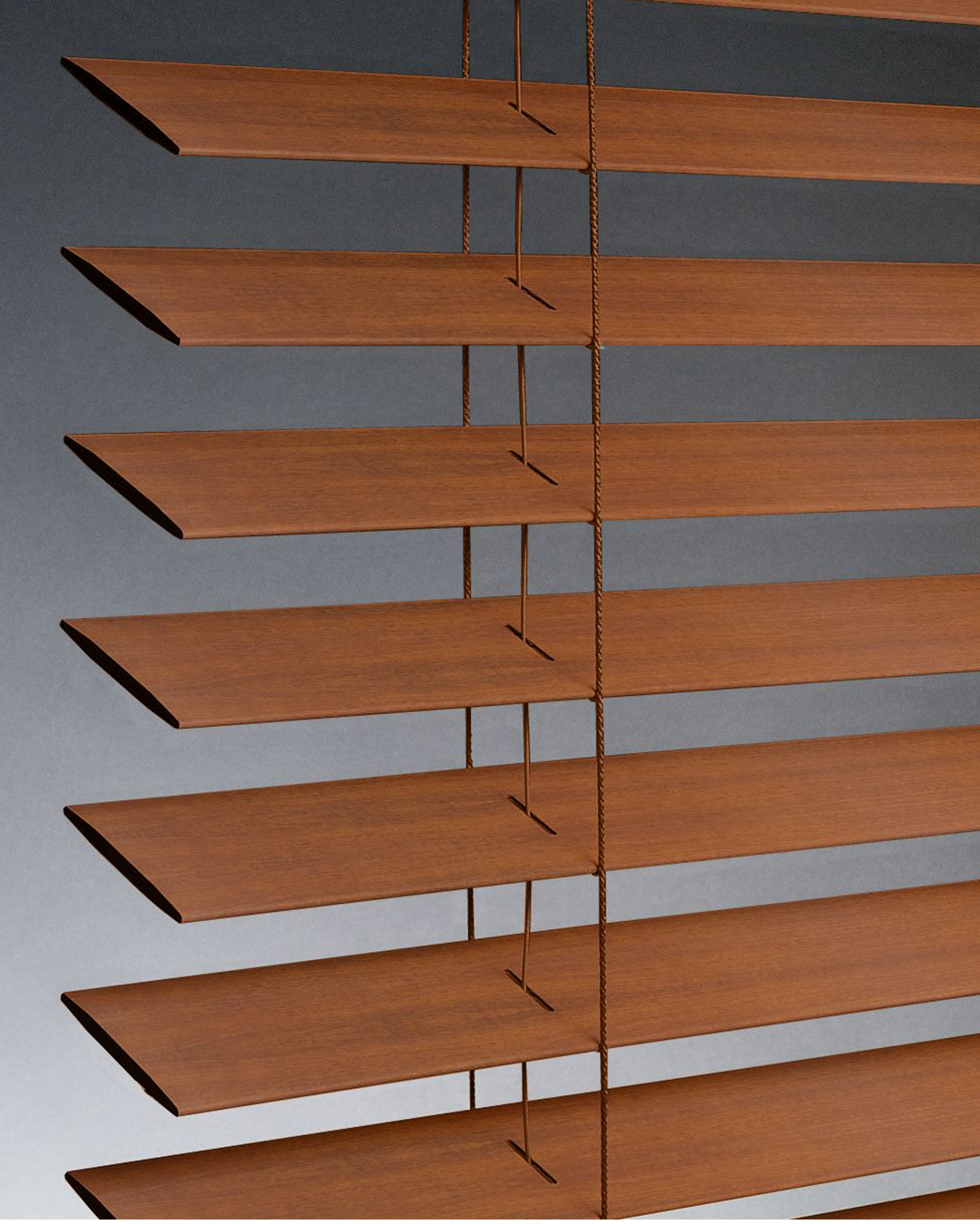 Faux wood blinds elegantly frame a window and give the interior design a hint of refinement and coziness.