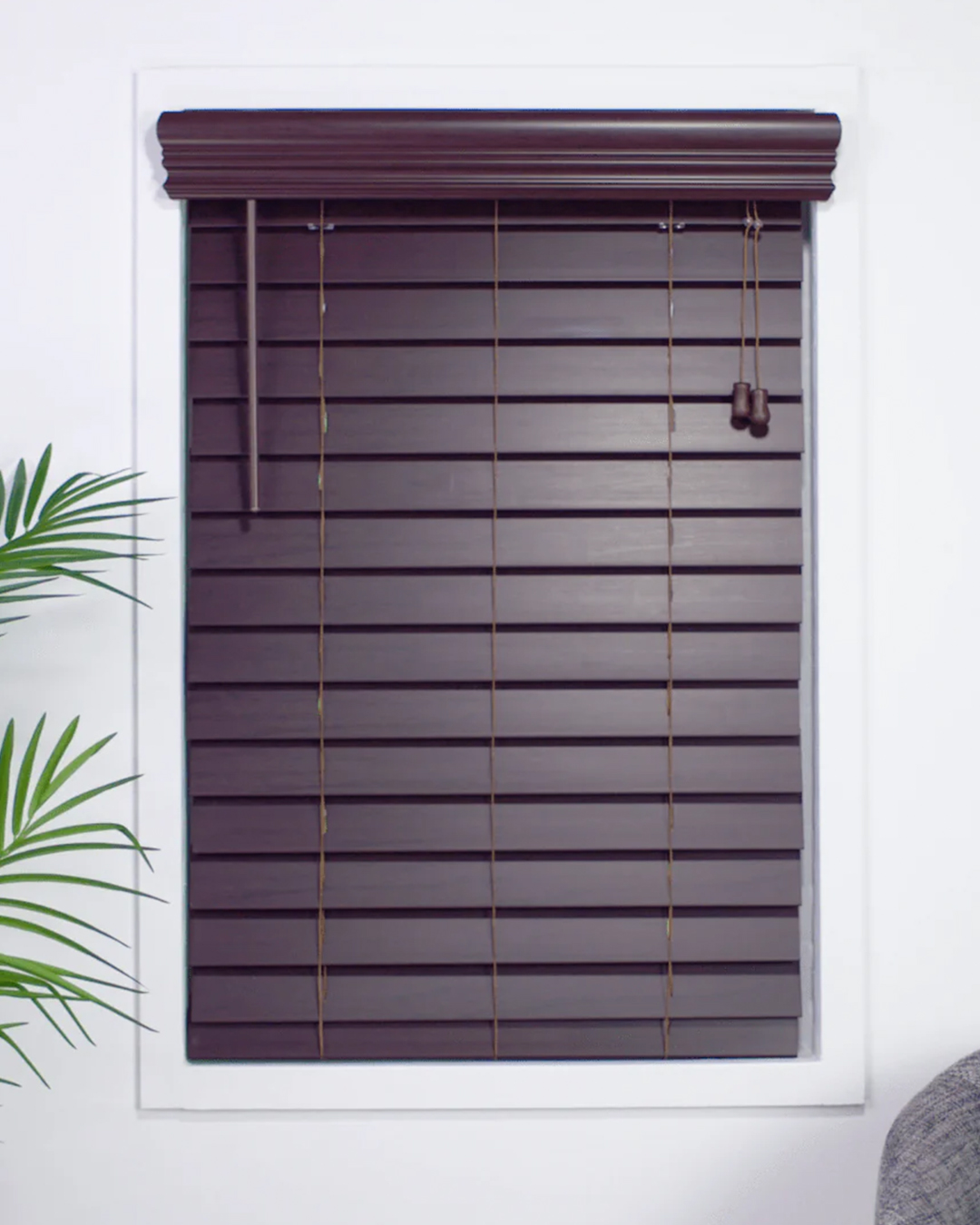 Stylish, natural wood-like faux wood blinds that balance light and seclusion in a brightly lighted environment.