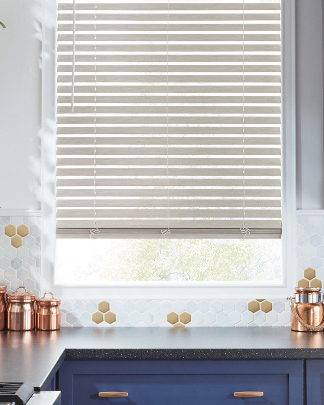 Composite blinds, which combine functional light control characteristics with aesthetic appeal, are tastefully exhibited in a room with natural light.