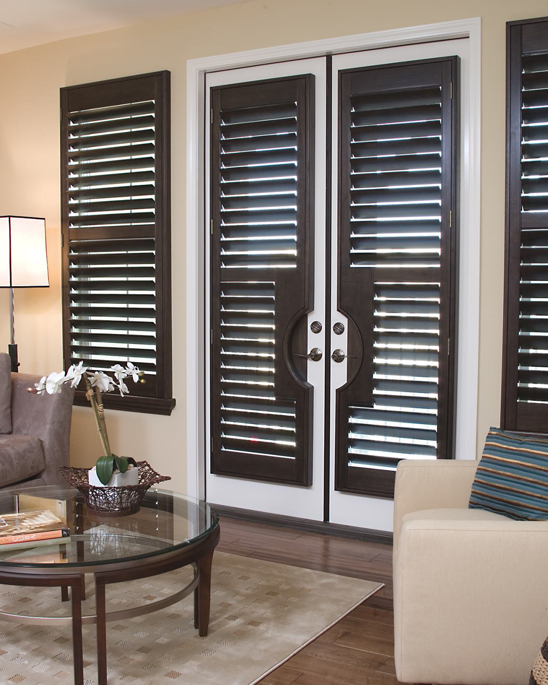 wood shutters for the interior that add style and seclusion while blending in with the overall decor of the space.