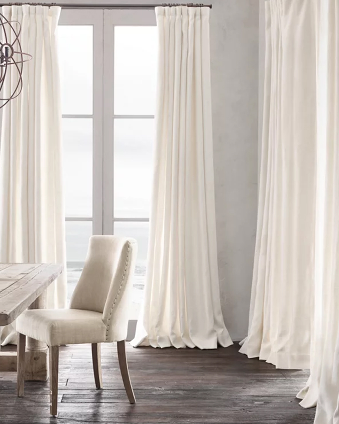 Elegant and charming draperies in vivid colors that hang smoothly and provide a touch of sophistication to the home design.