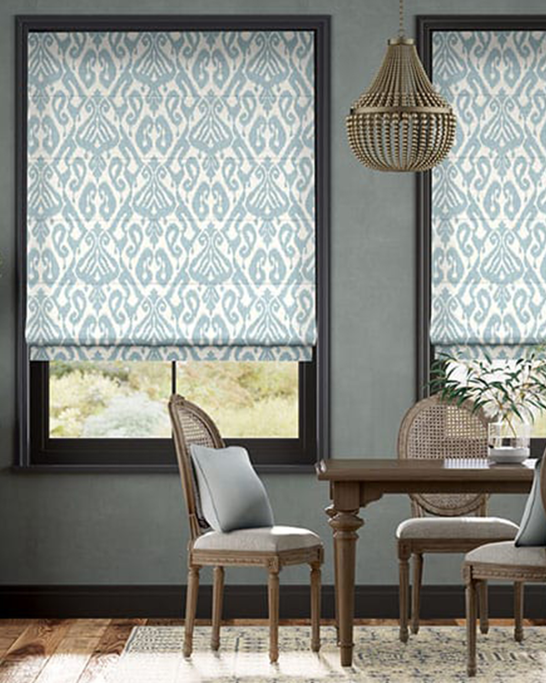 Classy soft shades cover a window, letting diffused light fill the room with a warm atmosphere.