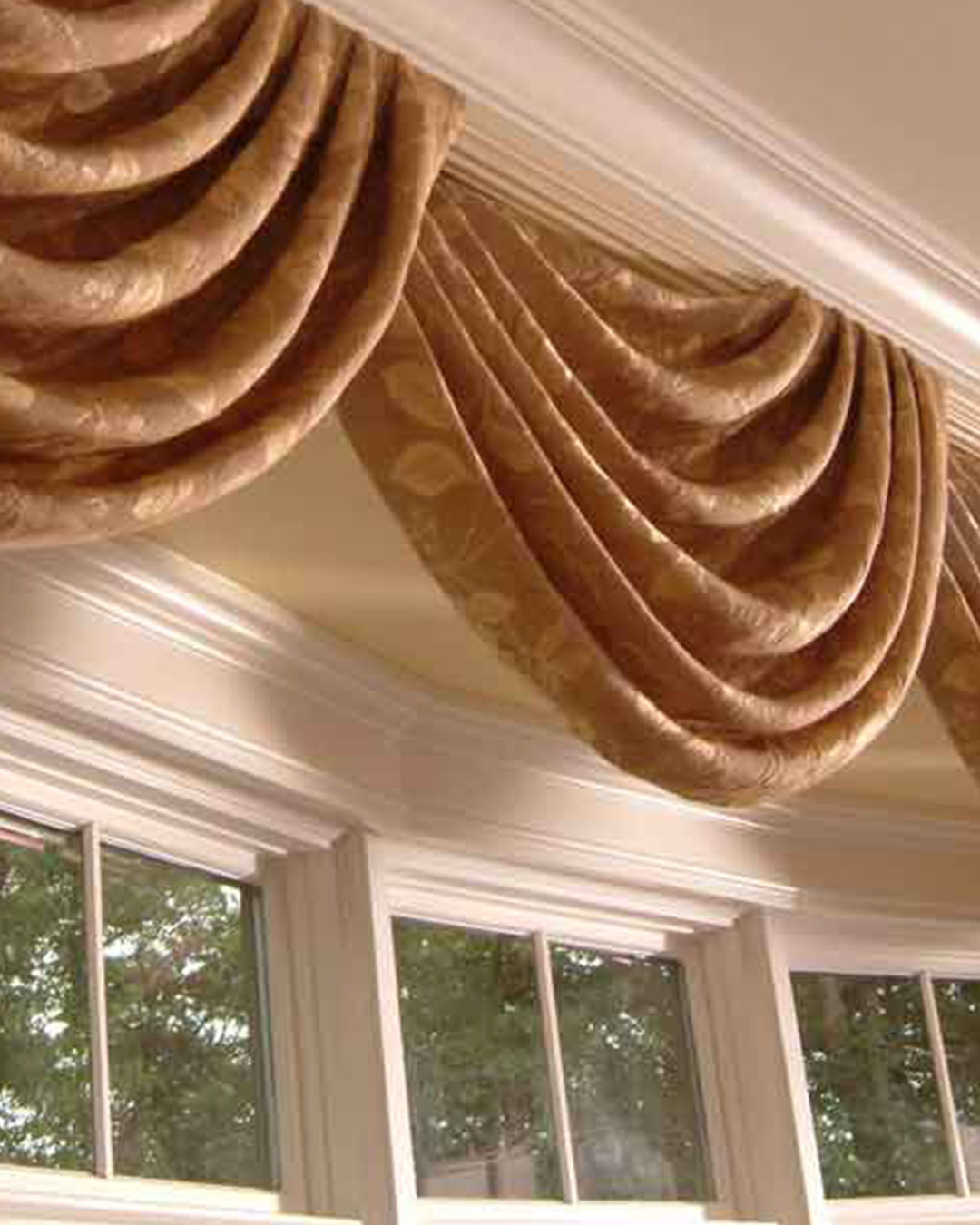 Decorative cornices and valances add a fashionable touch to house decor by exquisitely framing windows.