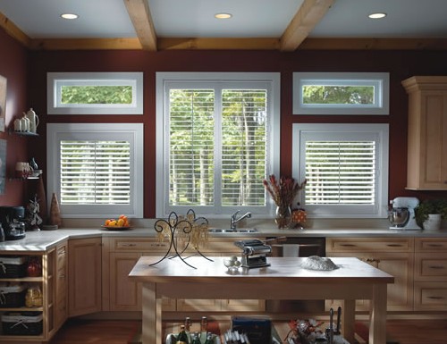 A wooden shutter firmly closed over a window improves the aesthetic appeal and privacy of the space.