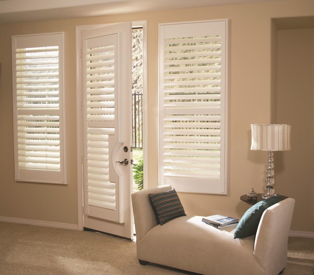 Composite blinds are showcased in a chic space, emphasizing their adaptability and sophisticated look as window treatments.
